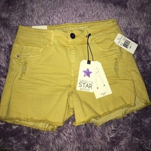 Yellow ripped shorts